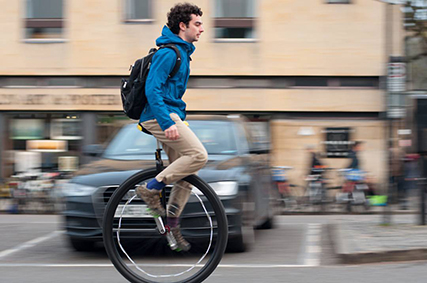 Mark on his unicycle